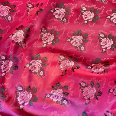 Hochwertige Trachtenstoffe und traditionelle Dirndlstoffe als Meterware aus Seide für Schürzen pink im Chiemgauer Heimatwerk