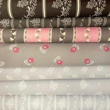 Hochwertige Trachtenstoffe und traditionelle Dirndlstoffe als Meterware hellgrau und dunkelgrau im Chiemgauer Heimatwerk